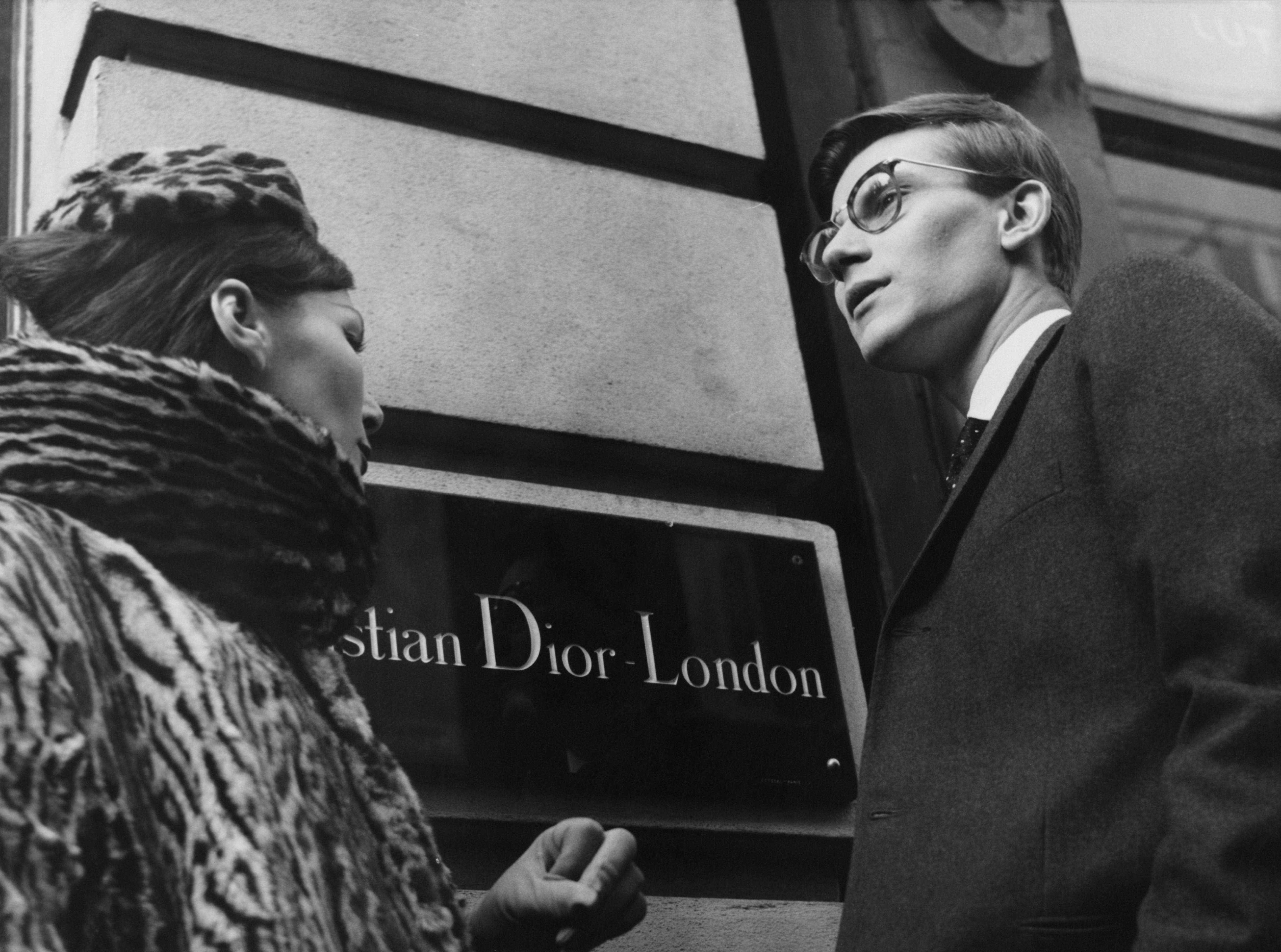 French fashion designer Yves Saint Laurent (1936 - 2008) in London, 11th November 1958. He is preparing for the following day's Dior Autumn collection show to an audience including Princess Margaret, at Blenheim Palace. (Photo by Popperfoto/Getty Images)
