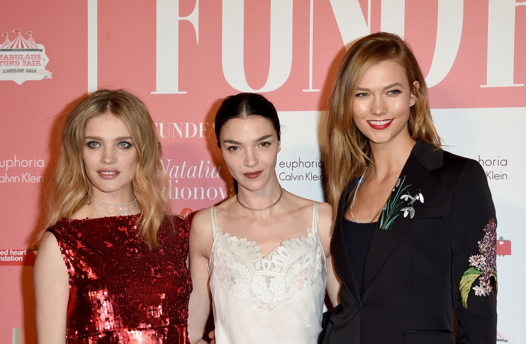 LONDON, ENGLAND - FEBRUARY 20: (L-R) Natalia Vodianova, Mariacarla Boscono and Karlie Kloss at The Naked Heart Foundation's Fabulous Fund Fair in London at Old Billingsgate Market on February 20, 2016 in London, England. (Photo by David M. Benett/Dave Benett / Getty Images for The Naked Heart Foundation) *** Local Caption *** Natalia Vodianova; Mariacarla Boscono; Karlie Kloss